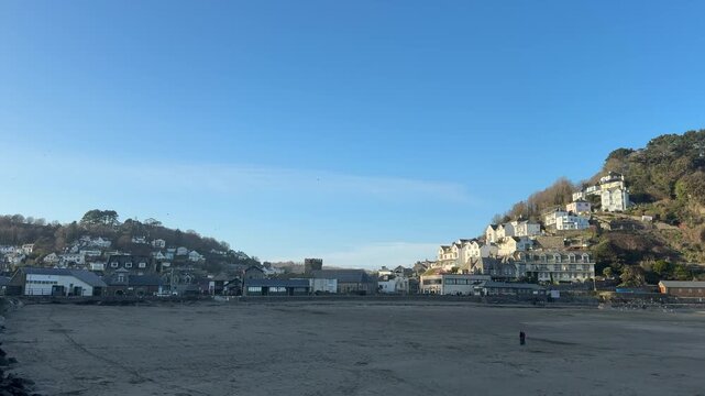 Looe seaside town in Cornwall looking down river to tourist area in holiday spot in England  pretty UK 4K