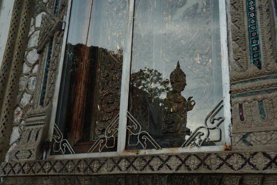 reflections of the windows of the old temple