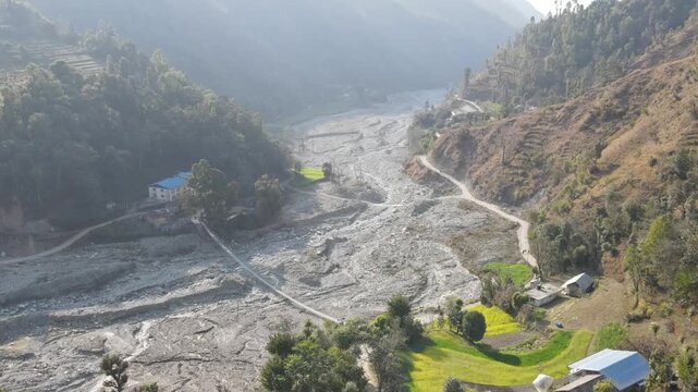 Flooded Village Along River  Aerial View of Natural Disaster