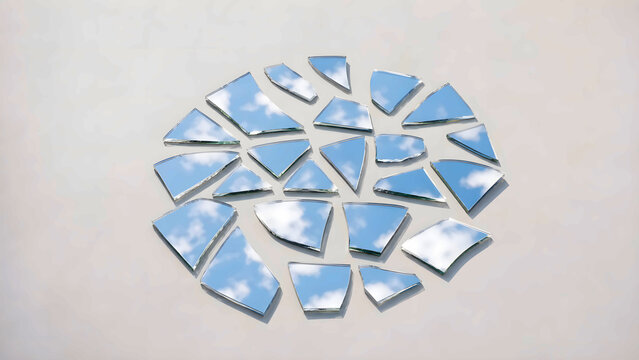 Mirror fragments reflecting sky in a calm abstract arrangement