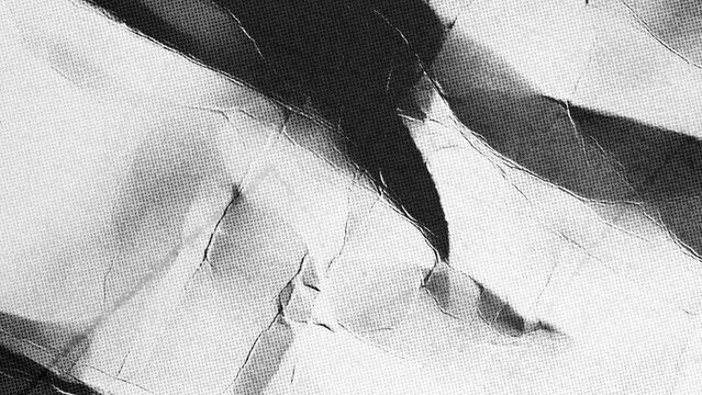 Halftone crumpled paper texture with black dots, rough, and wrinkled surface. Wite creased sheet background in comic pop-art style, featuring grainy folds and gritty distressed details.