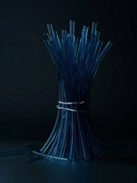 Blue Paintbrushes Tied with Twine on Dark Background