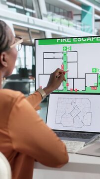 Fire Safety Officer Reviewing Emergency Evacuation Routes