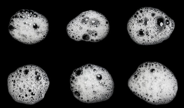 Set of six realistic white soap foam bubbles with detailed lather texture isolated on black background, cleansing and hygiene collection for shampoo, detergent, skincare, and cleaning design.