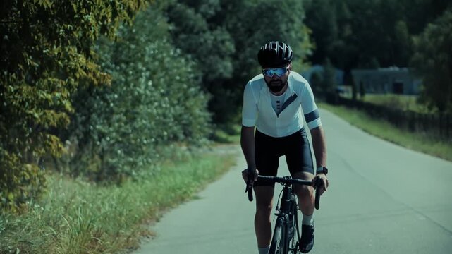 Cyclist Riding Road Bicycle On Asphalt Suburban Highway. Sports Workout