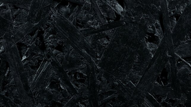 Matte black painted OSB oriented strand board texture background