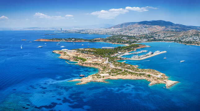 Aerial summer view of the south coast of Athens, Greece, with Vouliagmeni bay, Laimos peninsula and Astir beach