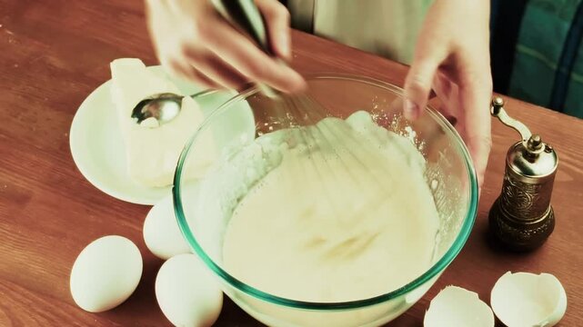 Cook Preparing The Dough For Baking Cream In Glass Bowl. Cooking Dessert 