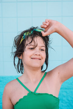 Taking off goggles at the public pool