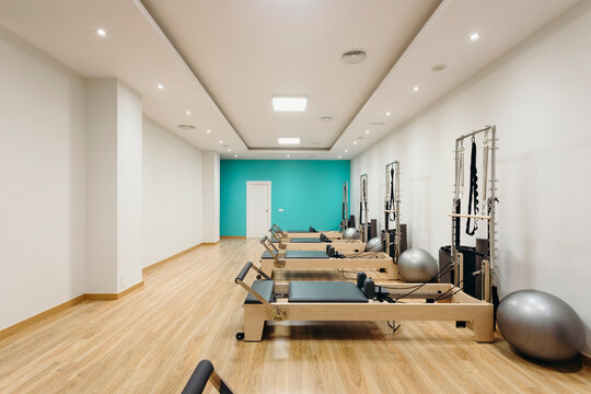 Reformer equipment and fitness ball in pilates studio