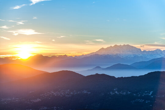 Sunset over Monte Rosa and the Alps from Monte Bre Switzerland