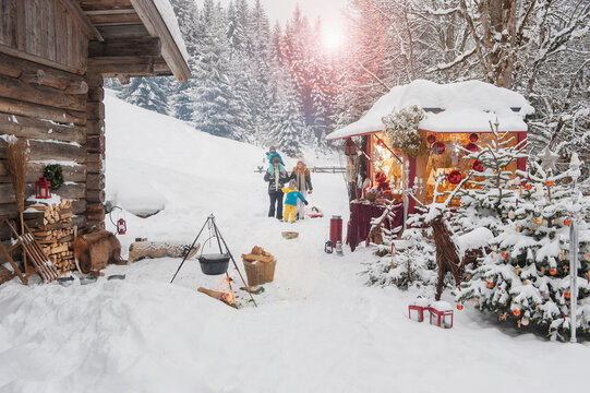 Austria, Altenmarkt, family at Christmas market