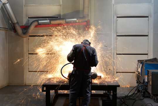 Welder working in a factory