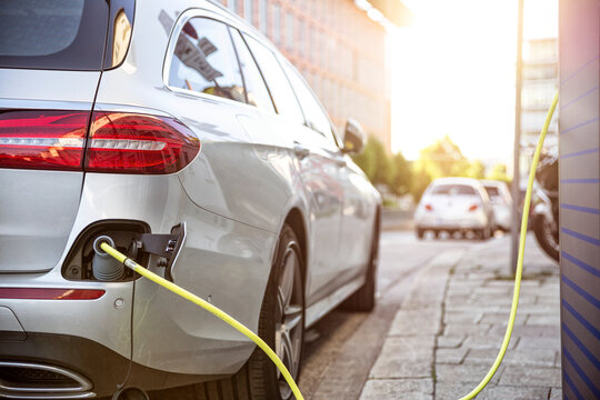 Electric car gettig charged at an charging station
