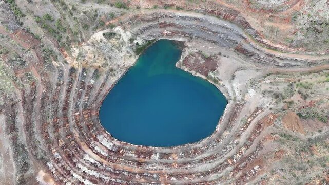 Aerial View of the Abandoned Mary Kathleen Uranium Mine Open Pit with Vibrant Blue Water, Outback Queensland Australia