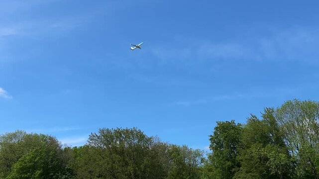 Aircraft flying over Amsterdam Forest park near Schiphol Airport, Netherlands Aircraft flying over Amsterdam Forest