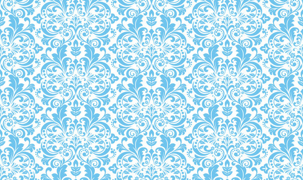 Floral pattern. Seamless vector background. Vintage wallpaper in the Baroque style. White and blue ornament for fabric, wallpaper, packaging. Ornate Damask flower illustration