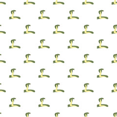 Obraz premium Cobra snakes in green and yellow colors creating a repeating tiled pattern