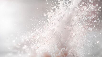 Fototapeta premium Macro view of sparkling sugar crystals with soft white light and delicate bokeh, abstract sweet texture background for food and beauty themes.