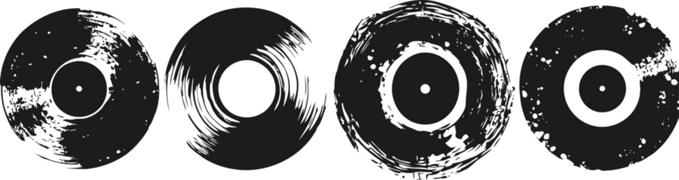 Set of four black vinyl records with distressed worn and scratched grunge textures
