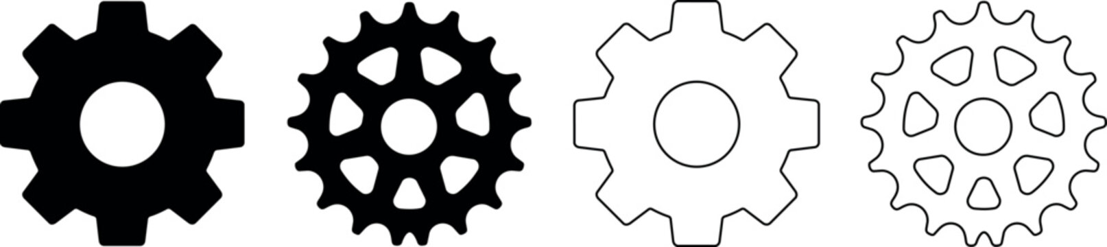 Set of four gear wheel graphics, two solid black and two outline