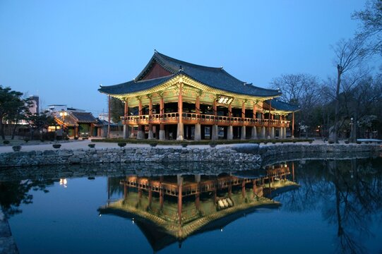 Gwanghallu Pavilion - Beautiful traditional Korean wooden architecture with pond in Namwon, South Korea. Historic royal garden heritage travel stock photo.