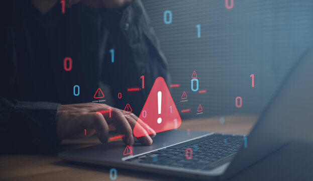 Cybersecurity warning on laptop highlighting cyber attack, malware detection, data breach risk, network protection, and digital security for enterprise IT, cloud computing, and online privacy.