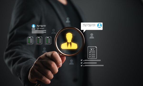 Recruitment and candidate screening concept with magnifying glass highlighting talent acquisition, resume evaluation, employee selection, hiring process, HR management, and workforce recruitment.
