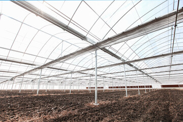 Naklejka premium Tilled Soil Inside a Vegetable Greenhouse in Jiaxing, Zhejiang, China