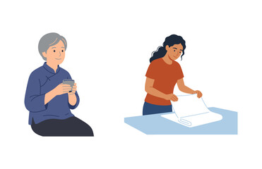 Fototapeta premium Elderly Woman Relaxing with Tea and Young Person Organizing Fabric or Paper at a Table