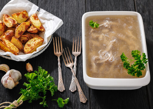 Gourmet meat aspic with roasted potato wedges
