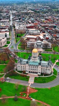 Vast cityscape of Hartford, Connecticut, the USA. Drone approaching the building of Connecticut State Capitol. Vertical video