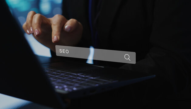 Business Professional Using SEO Search Interface on Laptop for Digital Marketing and Online Growth Strategy