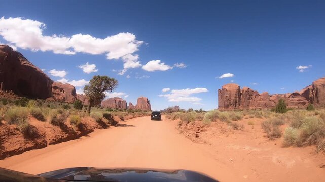 Epic landscape views of Monument Valley Navajo Tribal Park with towering mesas and breathtaking desert vistas