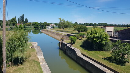 Fototapeta premium Petit port fluvial de la Truchère sur la Seille , rivière de Saône et loire , FRANCE