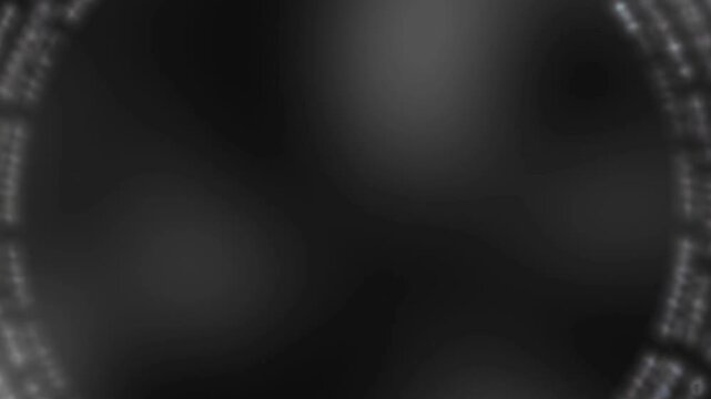 Blurry abstract background with dark colors and circular shapes in the center