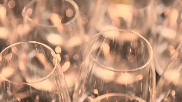 Close up of arranged crystal wine glasses with thin glass stems