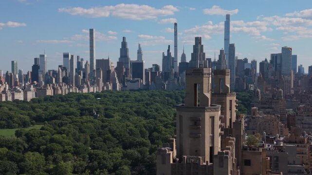long lens orbit clockwise around iconic towers on Central Park West in NYC