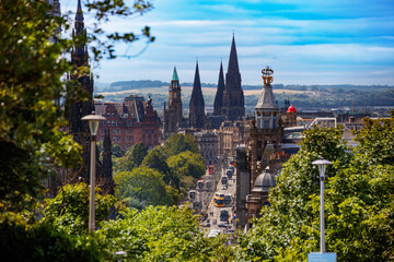 Fototapeta premium Princes street in Edinburgh with Gothic spires and trees, UK