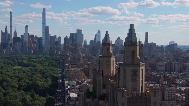 long lens orbit counter clockwise around iconic towers on Central Park West in NYC
