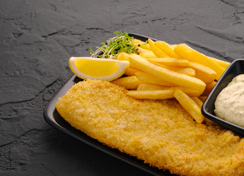 Fish and chips with lemon and tartar sauce