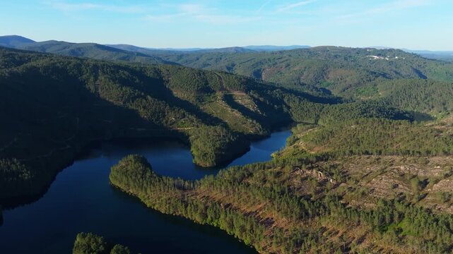 Avia River Through Lush Green Valley From Mirador de San Vicente In Avi&oacute;n, Ourense Province Of Galicia, Spain. Aerial Drone Shot