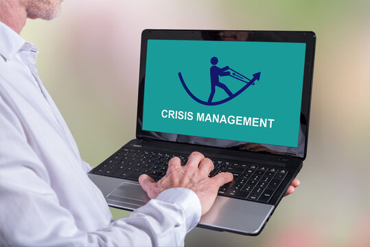 Crisis management concept on a laptop