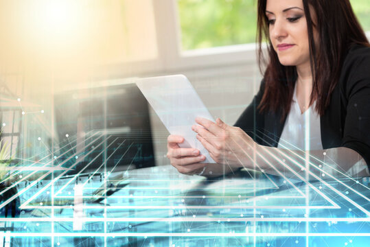 Businesswoman using digital tablet; multiple exposure