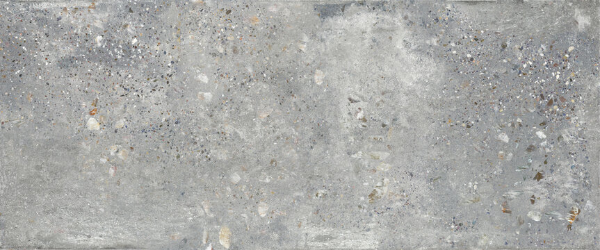 Gray terrazzo concrete texture background with natural stone fragments and industrial cement surface details. Modern architectural material featuring rough terrazzo patterns, neutral tones, and realis