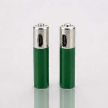 Two green rechargeable AAA lithium batteries with built-in USB-C charging ports on a white background