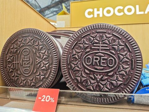 Moscow, Russia - June 22, 2026: Oreo cookies displayed on a shelf with a promotional discount tag in a grocery store, showcasing the brand and packaging design