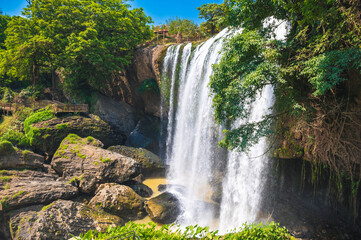 Fototapeta premium Elephant Waterfall in Dalat in Vietnam. A famous tourist attraction is Thac Voi Waterfall in Asia