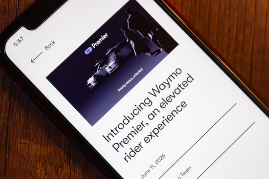 Mexico City, MEXICO - Jun 25 2026 : Smartphone displaying the Waymo blog post introducing Waymo Premier, an invite-only membership program for the autonomous ride-hailing service.