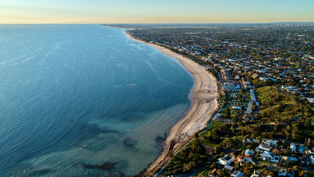 Seacliff, Adelaide, South Australia &ndash; 4K aerial drone view of sandy beach, Gulf St Vincent coastline, sunset seascape, coastal suburb, homes, scenic shoreline, Kingston Park, Brighton, Marino